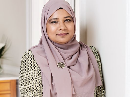 A distant headshot of Rubina, staff member at Blood Cancer UK.