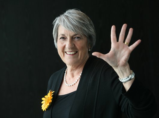 Angela Knowles, inspiration for Calendar Girls, and honorary president Blood Cancer UK smiles and waves at the camera.