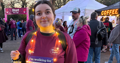 Ilona wearing fairy lights over her Walk of Light t-shirt