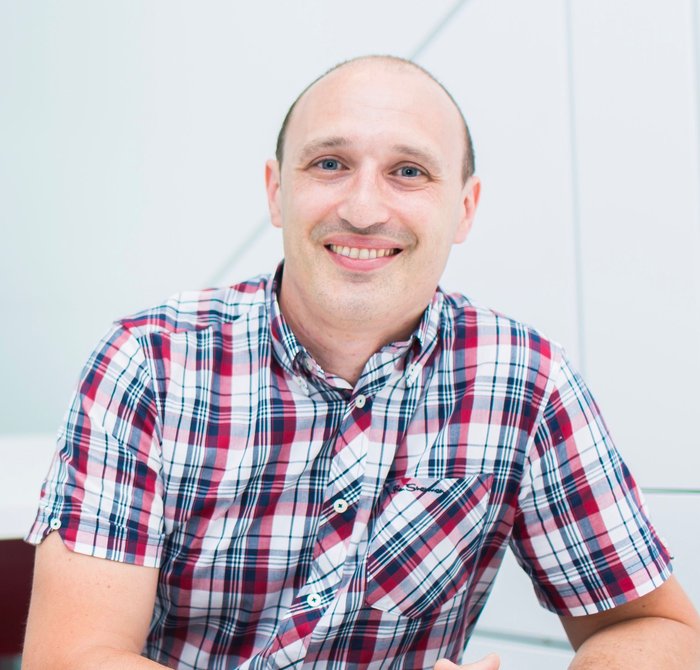 Dr Daniel Wiseman smiling at the camera