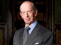 The Duke of Kent, stood in front of ornate panels
