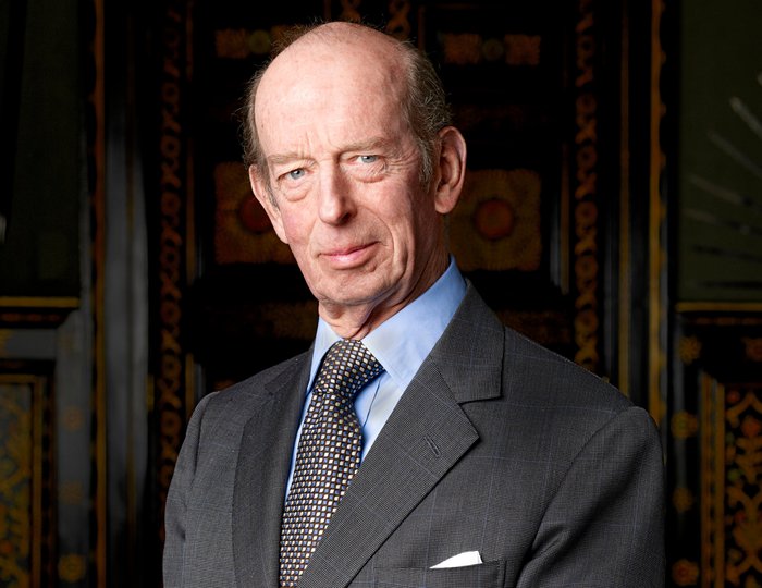 The Duke of Kent, stood in front of ornate panels