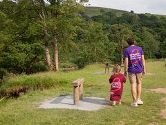 Ben Sykes, employee of Blood Cancer UK with daughter Ivy walking at Bolton Abbey in Yorkshire.