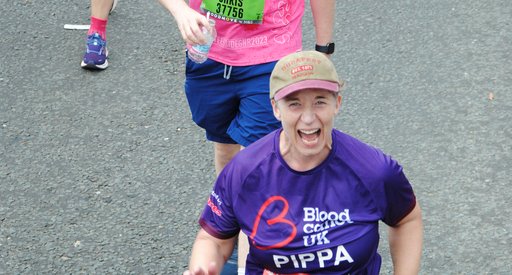 Blood Cancer UK runner at the Great North Run cheering into the camera
