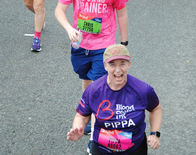 Blood Cancer UK runner at the Great North Run cheering into the camera