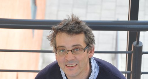 Professor Georges Lacaud stood in the lab smiling.