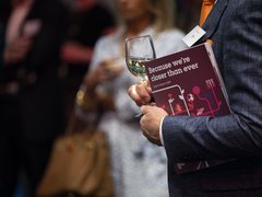 Man holding booklet