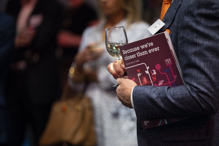 Man holding booklet