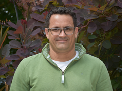 Headshot of Professor Ian Hitchcock smiling at the camera