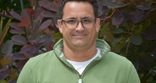 Headshot of Professor Ian Hitchcock smiling at the camera