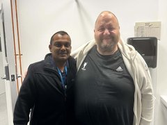 Support nurse and Joe livign with blood cancer standing next to each other