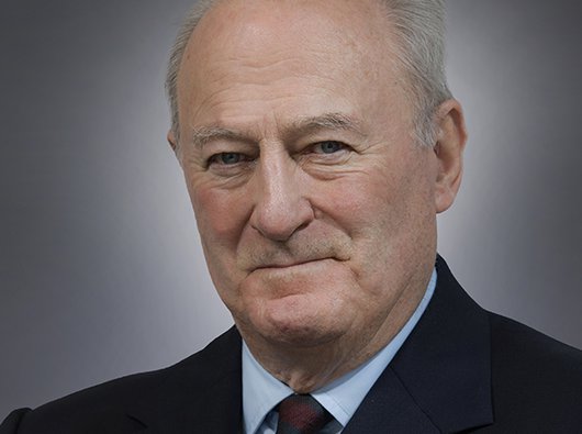 A headshot of Lord Cadogan, former honorary president of Blood Cancer UK, wearing a suit.