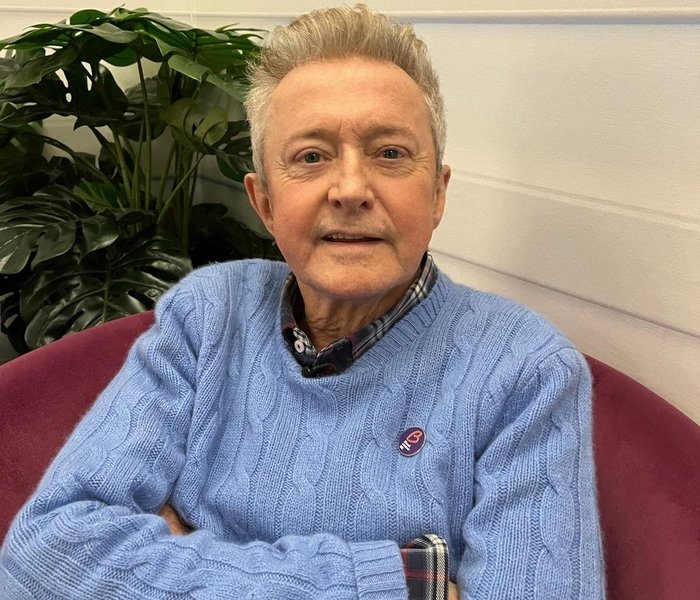 Louis Walsh wearing a blood cancer uk pin badge