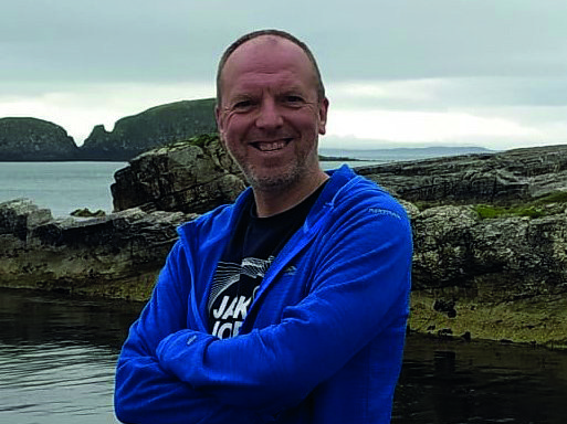 A middle-aged man, Nigel, who has been living with blood cancer since 2015.