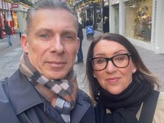 two people looking into the camera