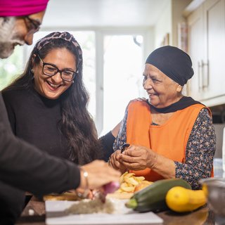 A family preparing a meal together