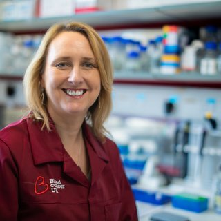 Michelle, conducting research at Blood Cancer UK.