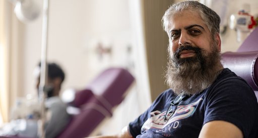 A male in hospital looking at the camera