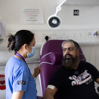 Image of a nurse and patient