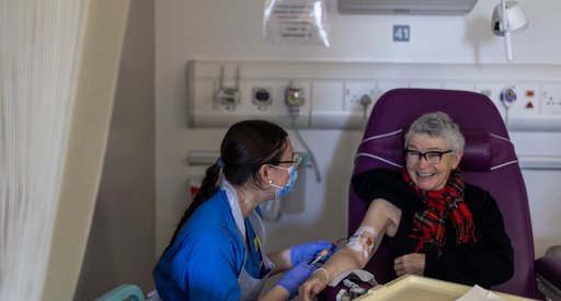 A woman in hospital having her bloods taken by a female nurse