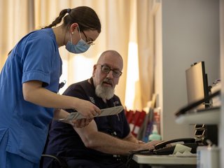 Healthcare professionals looking at notes