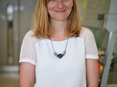 Dr Sarah Dimeloe stood smiling.