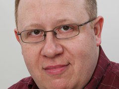 Portrait photograph of Stephen Pollard
