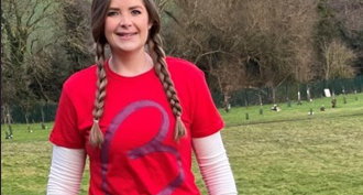 Close up of female wearing red Blood Cancer UK t-shirt