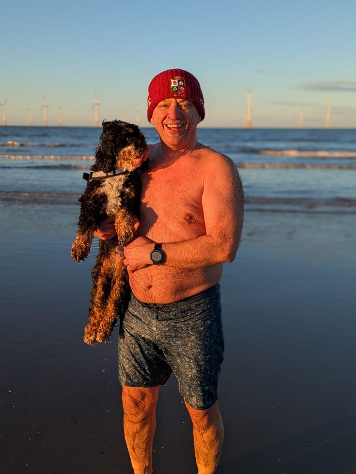 Man and his dog at the beach
