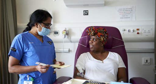 Nurse with patient at Barts hospital