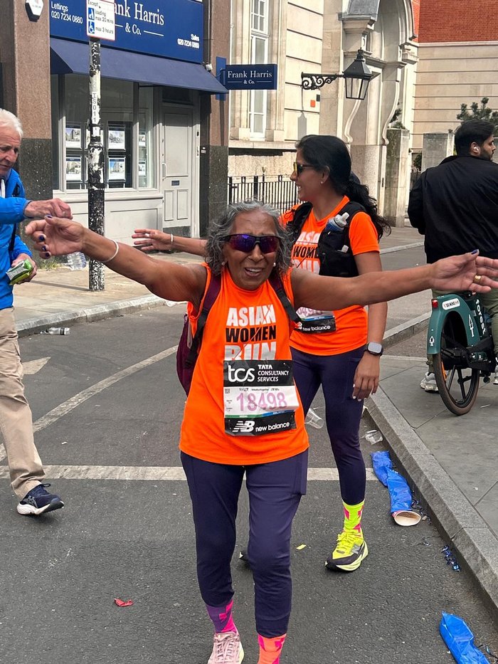 Women running celebrating