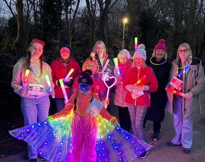 Group pf walkers taking on their own Walk of Light challenge for Blood Cancer UK