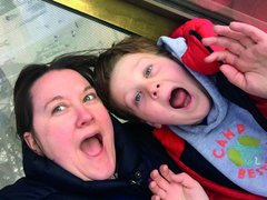 A mother and son - Melody and Andrew - making faces into the camera.