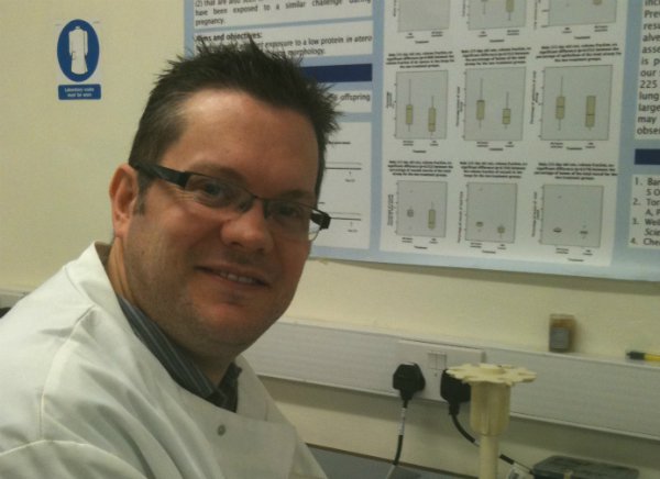 A research - Jonathan Strefford - working his lab.