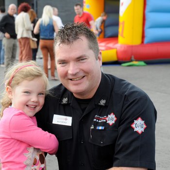 Ally, who has MDS, in uniform with his daughter.
