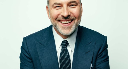 A headshot of the television celebrity David Walliams, smiling and looking into camera.