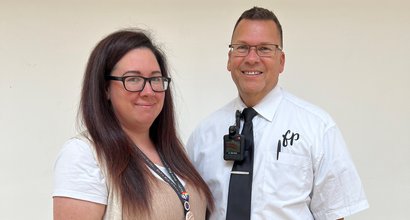 Mart and Kayleigh dressed for work with their lanyards on