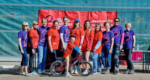 Supporters from the Grimsby Branch of Blood Cancer UK wear their charity T-shirts outside in the sunshine