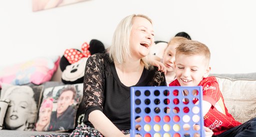 Kirsty and her family playing a game