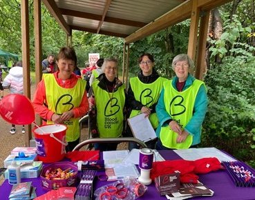 Supporters from the Glasgow and District Branch wear their Blood Cancer UK tabards at their stand