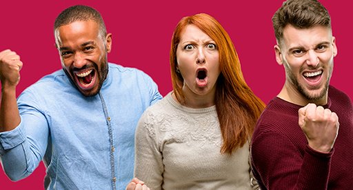 Three people pump their fists in victory